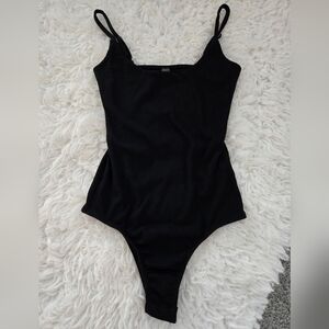 Alya Black Ribbed Bodysuit. Size Small. New without tags.